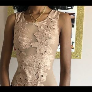 Two bodysuits one nude one black